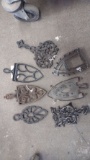 VINTAGE METAL TRIVETS, LARGEST IS ABOUT 9