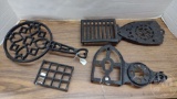 VINTAGE METAL TRIVETS, LARGEST IS 13