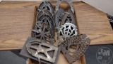 VINTAGE METAL TRIVETS, LARGEST IS 7