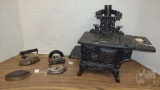 VINTAGE SALESMAN SAMPLE CASTIRON CRESCENT STOVE WITH SMALL IRONS