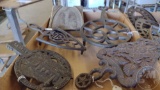 VINTAGE METAL TRIVETS, LARGEST IS 11