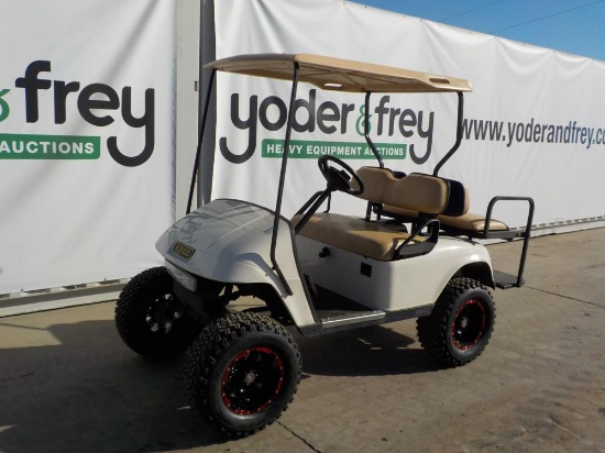 Ezgo  Customized Gas Golf Cart c/w Back Seat, Aluminum Wheels & Lift Kit