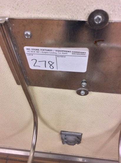 Wall mounted hose holder