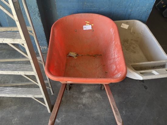 orange plastic wheelbarrow