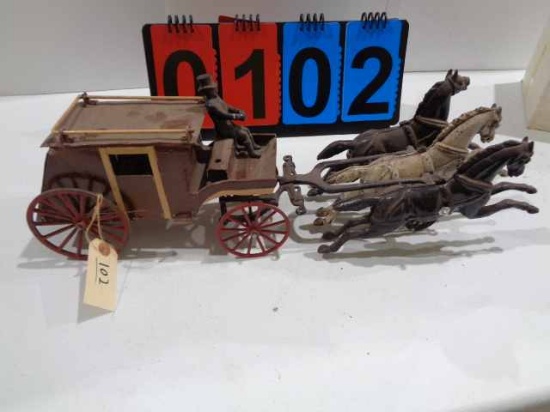 Stagecoach with 3 cast iron horses