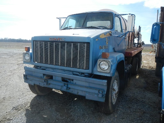 GMC BRIGADIER WATER TRUCK,  PS, SINGLE AXLE ON SPRINGS WITH PUSHER AXLE, 16