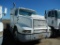 1989 INTERNATIONAL 8300 TRUCK TRACTOR,  TWIN SCREW, CUMMINS, 9 SPEED , SPRI