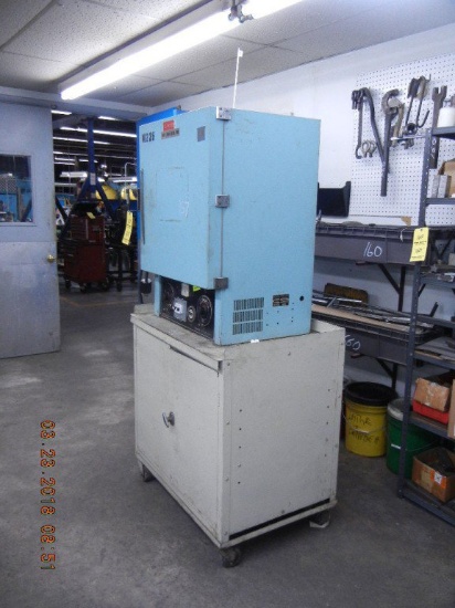 BLUE M OVEN ON ROLLING CABINET WITH CONTENTS C# M226