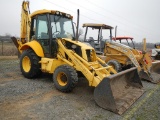 NEW HOLLAND LB75B LOADER BACKHOE, 6566 hrs,  ENCLOSED CAB, FRONT WHEEL DRIV