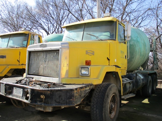 1997 VOLVO MIXER TRUCK,  CATERPILLAR DIESEL, 9-SPEED, TWIN SCREW, SPRING RI