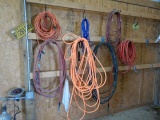 AIR HOSES AND EXTENSION CORDS  (ON SHOP WALL)