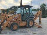 2006 CASE 580 II BACKHOE,  TURBO,RUNS, MISSING WINDOWS, RIGHT FRONT TIRE IS