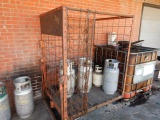 METAL CAGE WITH PROPANE BOTTLES
