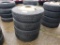 (4) ORIGINAL LOW PRO R24.5 TIRES ON  HUB PILOTS