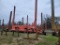 1998 SUN 4-BUNK LOG TRAILER,  TANDEM AXLE, 22,500LB AXLE CAPACITY,  (RED) S