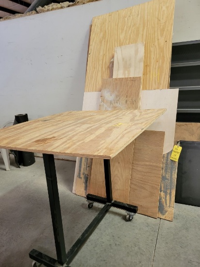 LOT OF PLYWOOD AND ROLL AROUND TABLE