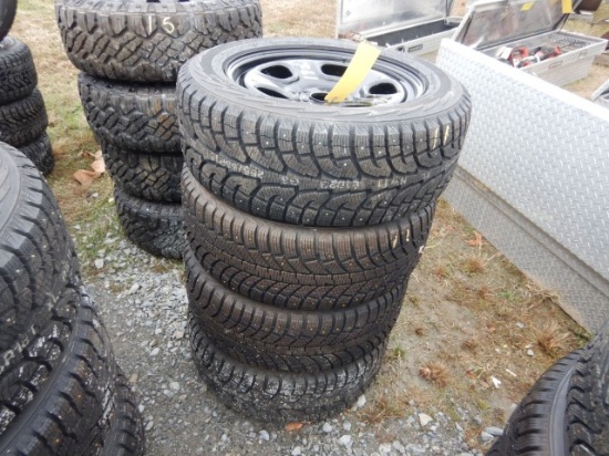 (4) 255/55R18 TIRES ON 5 HOLE RIMS