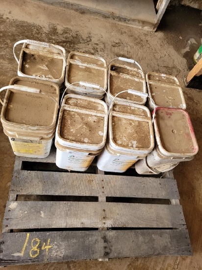 PALLET WITH (8) BUCKETS OF SEED LUBRICANT