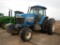 FORD NEW HOLLAND 8870 WHEEL TRACTOR 6953 +/- HOURS  CAB, AC, HEAT, POWER SH