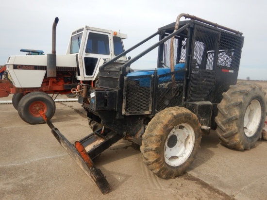 NEW HOLLAND TB100 WHEEL TRACTOR  FORRESTRY PACKAGE, FRONT MOUNTED WENCH AND