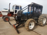 NEW HOLLAND TB100 WHEEL TRACTOR  FORRESTRY PACKAGE, FRONT MOUNTED WENCH AND