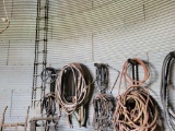 CONTENTS ON WALL :  AIR HOSE, SUCTION HOSE, WELDING LEADS, UNDERLAYMENT ROL
