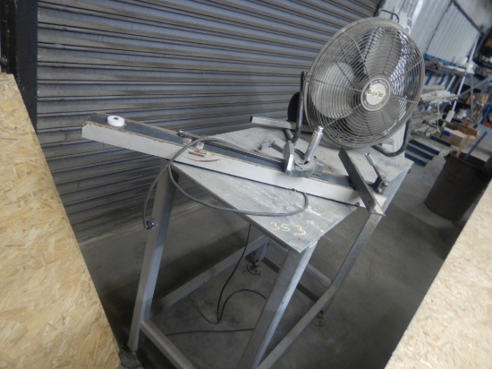 TABLE WITH ROUTER AND FAN