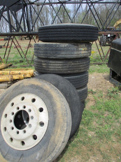 (8) 24.5 TIRES  ON ALUMINUM BUDDS