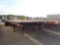 1986 HOBBS FLATBED TRAILER,  45', SPREAD AXLE, AIR RIDE, 24.5 TIRES ON BUDD