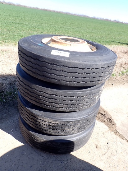 (4) 11R22.5 TIRES,  ON BUDDS