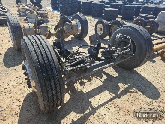 STEERABLE PUSHER AXLE