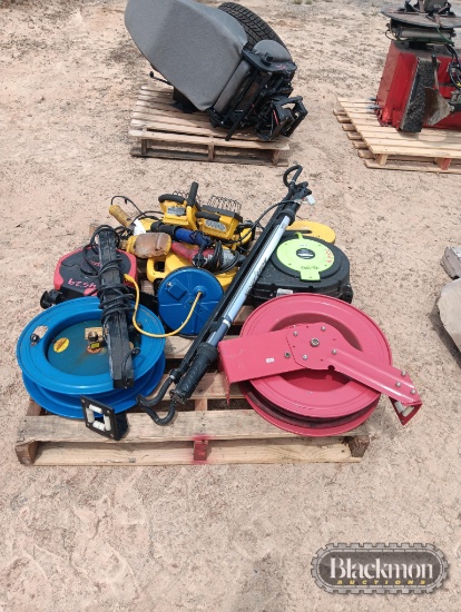 Pallet with Electric Cords, hose reels, lights, and miscellaneous