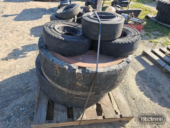(3) Small Solid Forklift Tires & (2) Large Solid Forklift Tires,