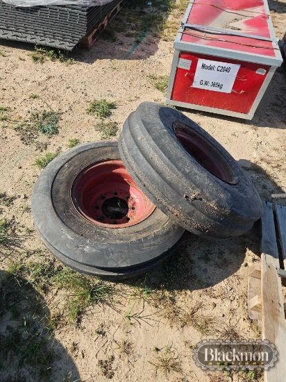 (2) 10.00-16SL Front Tractor Tires on IH 8-Hole Wheels