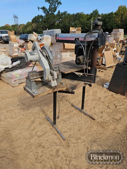 Table with Craftsman Radial Arm Saw and Rockwell Mitre Saw