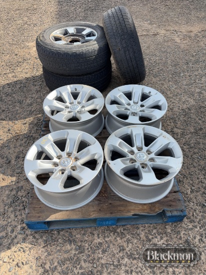 Set of dodge wheels and (3) 8 lug wheels
