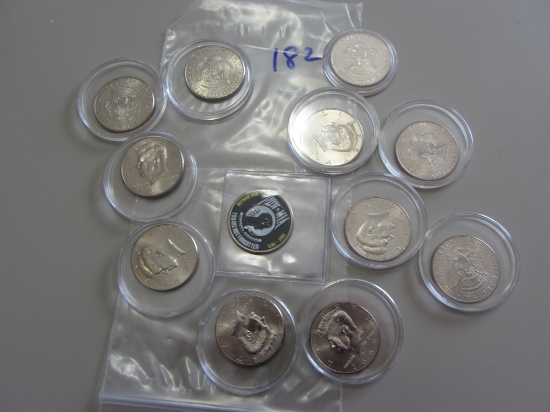 LOT OF 12 UNCIRCULATED KENNEDY HALF DOLLARS IN CASE