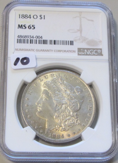 $1 1884-O MORGAN NGC 65