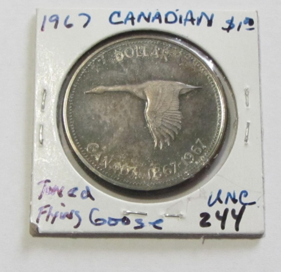 1967 TONED CANADA $1 SILVER