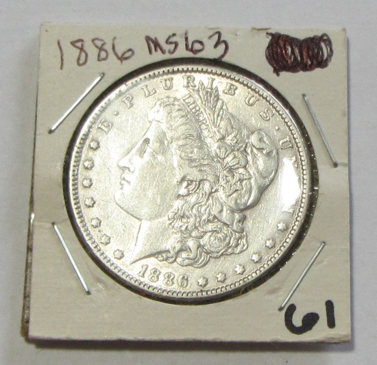 $1 1886 MORGAN SILVER DOLLAR HIGH GRADE
