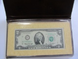 $2 Federal reserve note in folder