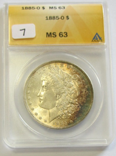 $1 TONDED 1885-O MORGAN ANACS 63