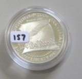 $1 SILVER COMMEMORATIVE UNINTED STATED MINT IN CAP