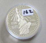 $1 SILVER COMMEMORATIVE UNINTED STATED MINT IN CAP