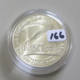 $1 SILVER COMMEMORATIVE UNINTED STATED MINT IN CAP