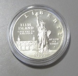 1986-S SILVER PROOF $1 ELLIS ISLAND