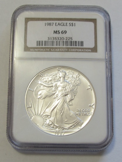 1987 $1 SILVER EAGLE NGC 69
