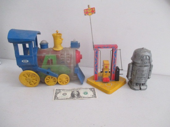 Tin Robot on Swing, 1974 Ban & Hrico Robot Metal Bank and Ideal See-Through Train Engine