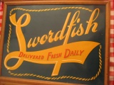 Swordfish served daily  fiberboard sign staining 25 1/2