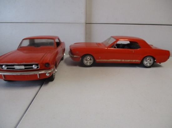 2 Plastic Mustangs with Metal Chassis - Have some wear